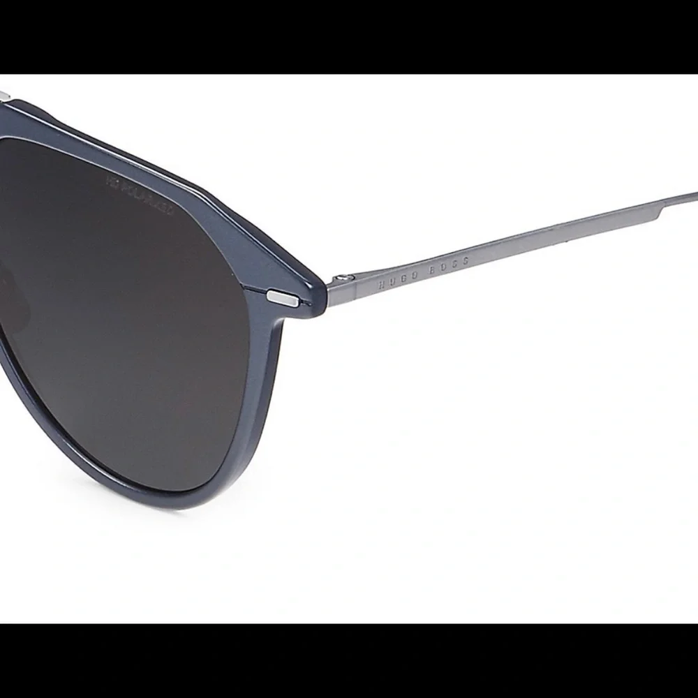 Hugo Boss feature an angular titanium frame and solid lenses - Picture 3 of 3